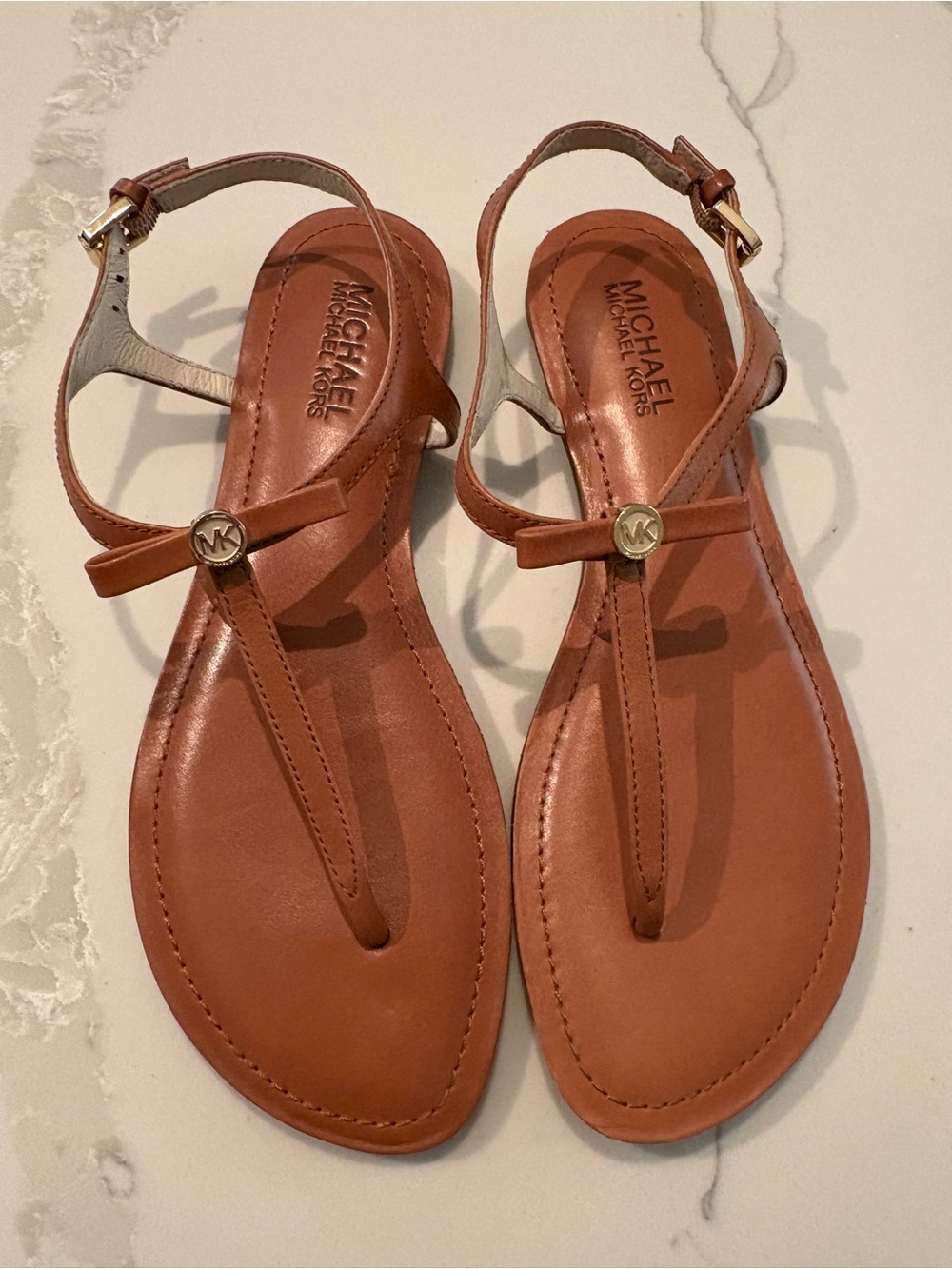 Michael Kors Tan Leather T-Strap Sandals with Gold MK Accent